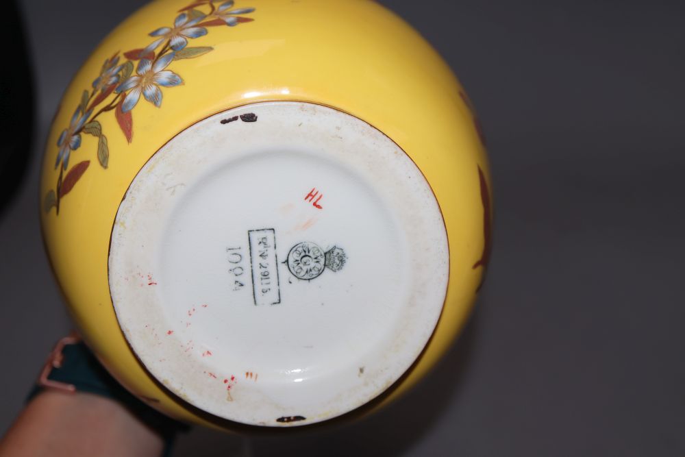 A Royal Worcester yellow ground jug, height 21cm